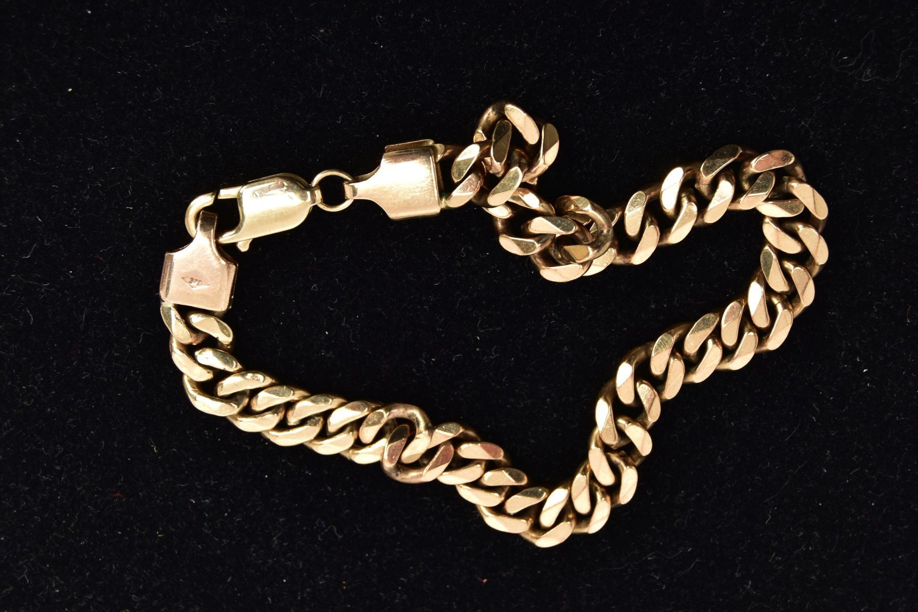 A 9CT GOLD HEAVY CURB LINK BRACELET, a flat curb link bracelet, approximate length 230mm, hallmarked - Image 2 of 2