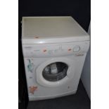 A HOTPOINT AQUARIUS TDL30 TUMBLE DRYER width 60cm with pipe (PAT pass and working)