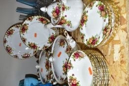 A THIRTY SIX PIECE ROYAL ALBERT OLD COUNTRY ROSES PART DINNER SERVICE, comprising a teapot (chip