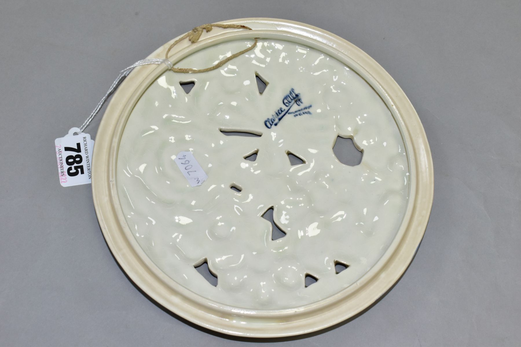 A CLARICE CLIFF WILKINSON LTD CIRCULAR BOUQUET WALL PLAQUE, relief moulded with pastel colour - Image 4 of 4