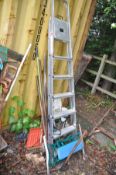 A PAIR OF ALUMINIUM STEP LADDERS height 200cm and a small quantity of garden tools