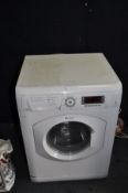 A HOTPOINT AQUARIUS WDD750 WASHING MACHINE width 60cm, depth 55cm and height 85cm (PAT pass and