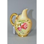 A ROYAL WORCESTER BLUSH IVORY JUG WITH GILT HANDLE, printed and tinted with flowers, shape no.