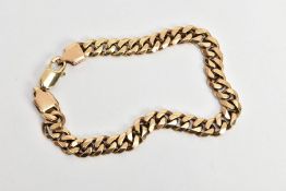 A 9CT GOLD HEAVY CURB LINK BRACELET, a flat curb link bracelet, approximate length 230mm, hallmarked