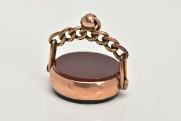 A LATE 19TH CENTURY 9CT GOLD SWIVEL FOB, of a circular form set with bloodstone and carnelian