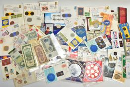 A CARDBOARD BOX CONTAINING COIN AND STAMP PACKS, ROYAL MINT COIN AND YEAR PACKS, to include BU