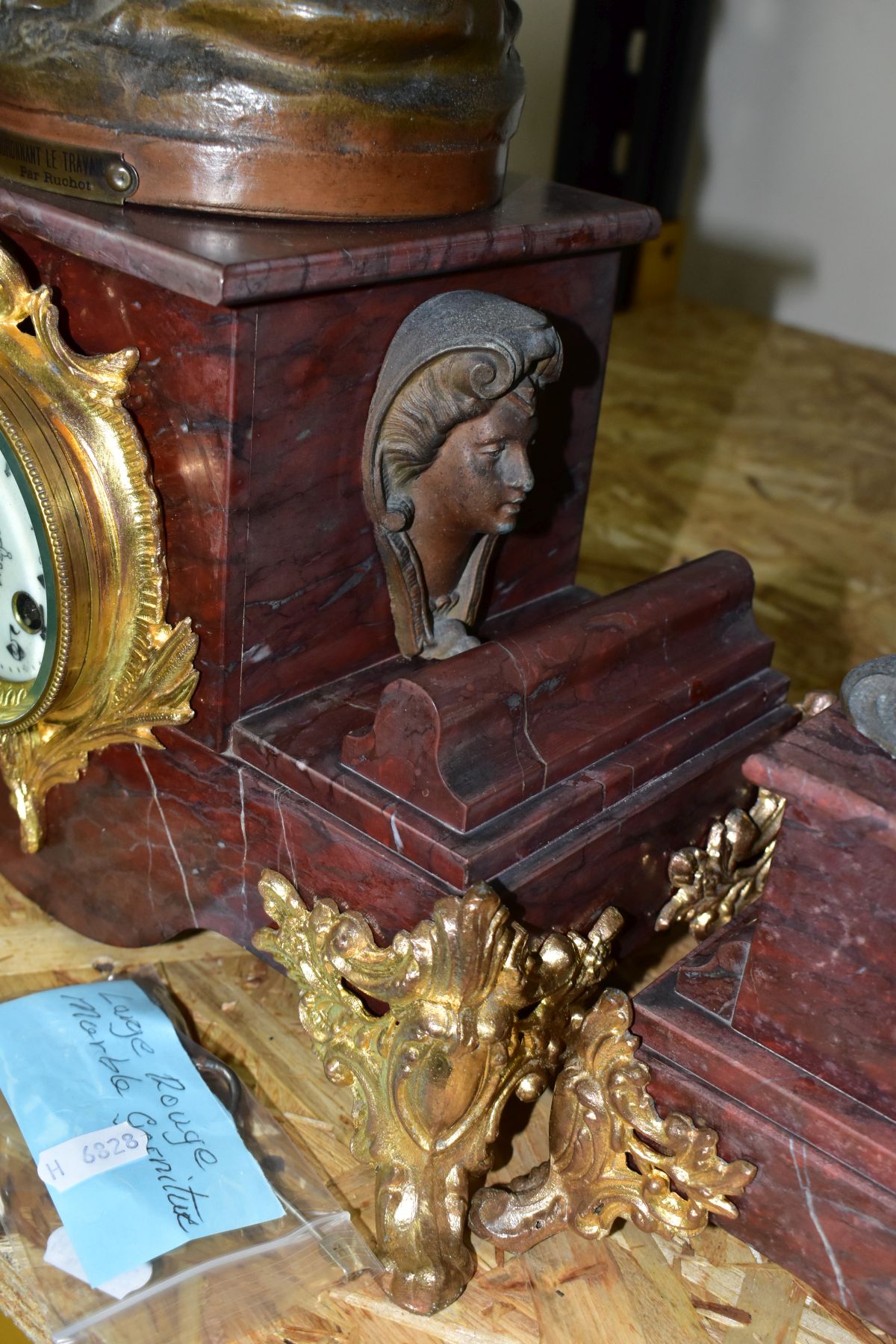 AN EARLY 20TH CENTURY BRONZED SPELTER AND ROUGE MARBLE CLOCK GARNITURE, the clock with figural - Image 10 of 10