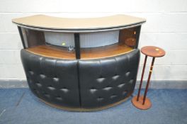 A MID CENTURY TEAK CURVED DRINKS BAR, with metal trim, buttoned faux leather front,