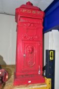 A REPRODUCTION CAST METAL POST BOX, painted red with gilt 'POST' lettering, crown finial and lion