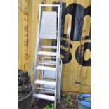 THREE STEP LADDERS, two of which are aluminium of similar heights 186cm and a small set of steel