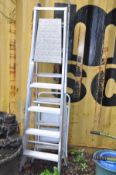THREE STEP LADDERS, two of which are aluminium of similar heights 186cm and a small set of steel