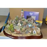 A LARGE BOXED LIMITED EDITION LILLIPUT LANE SCULPTURE, Out of The Storm no 0193/3000, with wooden