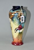 A MOORCROFT POTTERY BALUSTER VASE DECORATED WITH THREE BIRDS IN THE BRANCHES OF A PINE TREE,