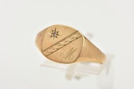 A 9CT GOLD SIGNET RING, a squared yellow gold signet ring, with a star set round brilliant cut