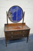 AN EDWARDIAN MAHOGANY AND INLAID DRESSING CHEST, with an oval mirror, and three drawers, width 107cm