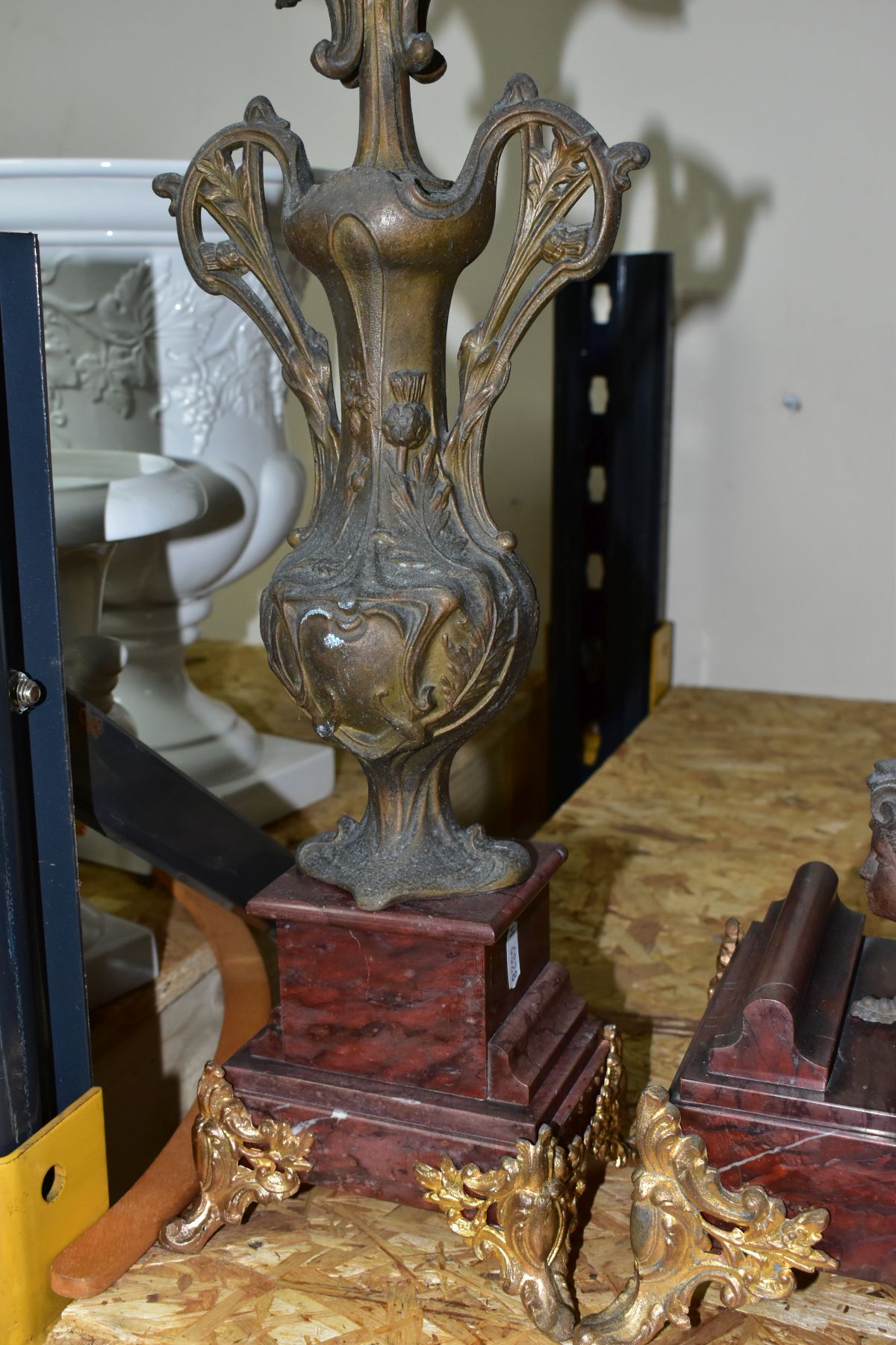 AN EARLY 20TH CENTURY BRONZED SPELTER AND ROUGE MARBLE CLOCK GARNITURE, the clock with figural - Image 6 of 10