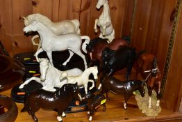 ELEVEN BESWICK AND ROYAL DOULTON HORSE FIGURES, comprising Royal Doulton The Winner DA154B/2 on