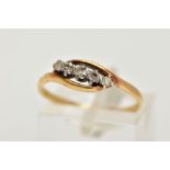 A YELLOW METAL FIVE STONE DIAMOND RING, designed with a row of graduating single cut diamonds,