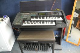 A YAMAHA ELECTONE EL-700 ORGAN with two keyboards, bass pedals, sustain and swell pedals along