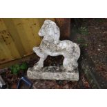 A COMPOSITE GARDEN FIGURE OF A PRANCING HORSE height 60cm