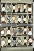 TWO BLACK DISPLAY CASES OF WRISTWATCHES, each with a Perspex lid, with twelve cushions and