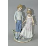 A LLADRO FIGURE GROUP 'ONE, TWO, THREE' NO.5426, sculpted by Jose Roig, issued 1987, printed,