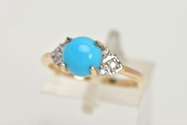 A YELLOW METAL TURQUOISE AND DIAMOND RING, centring on a circular turquoise cabochon in a four