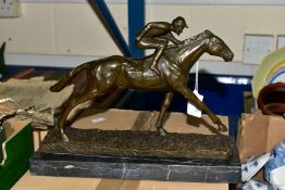 A BOXED REPRODUCTION BRONZE OF A RACEHORSE AND JOCKEY on a marble style plinth, approximately 21cm x