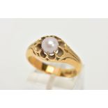 AN EARLY 20TH CENTURY GOLD, CULTURED PEARL RING, a heavy yellow gold tapered ring, set with a