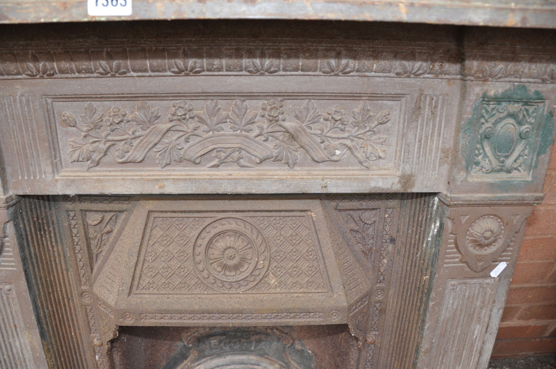 A CAST IRON FIRE SURROUND, with foliate and columned detailing, 'The Scotia' to the centre, along - Image 2 of 3