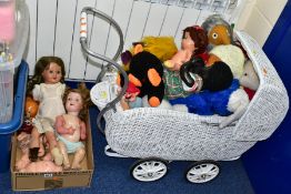 A BOX AND A DOLL'S PRAM OF DOLLS AND SOFT TOYS, comprising a white painted wicker doll's pram height