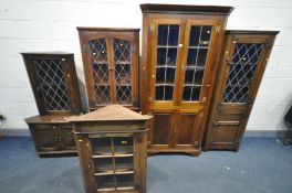 A SELECTION OF REPRODUCTION OAK CORNER CUPBOARDS, to include a lead glazed corner cupboard above
