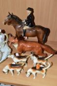 A BESWICK HUNTSWOMAN, HOUNDS AND FOX FIGURES, comprising Huntswoman on Brown Horse 1730 height 21cm,