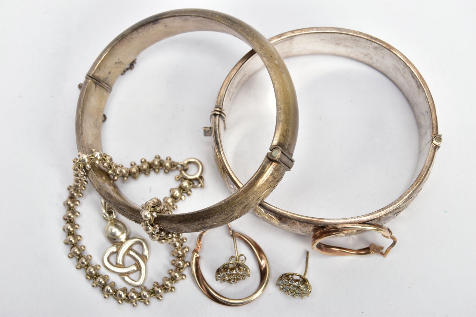 TWO SILVER BANGLES, EARRINGS AND A BRACELET, to include a wide hinged bangle decorated with a floral - Image 3 of 3