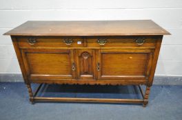 AN EALRY TO MID 20TH CENTURY OAK SIDEBOARD, with two drawers, width 152cm x depth 54cm x height 94cm