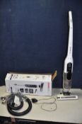A BOSCH ATHLET 25.2V CORDLES UPRIGHT VACUUM CLEANER with original box, attachments and charger (