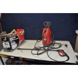 A CHAMPION CPW1600 PRESSURE WASHER (PAT pass and working)