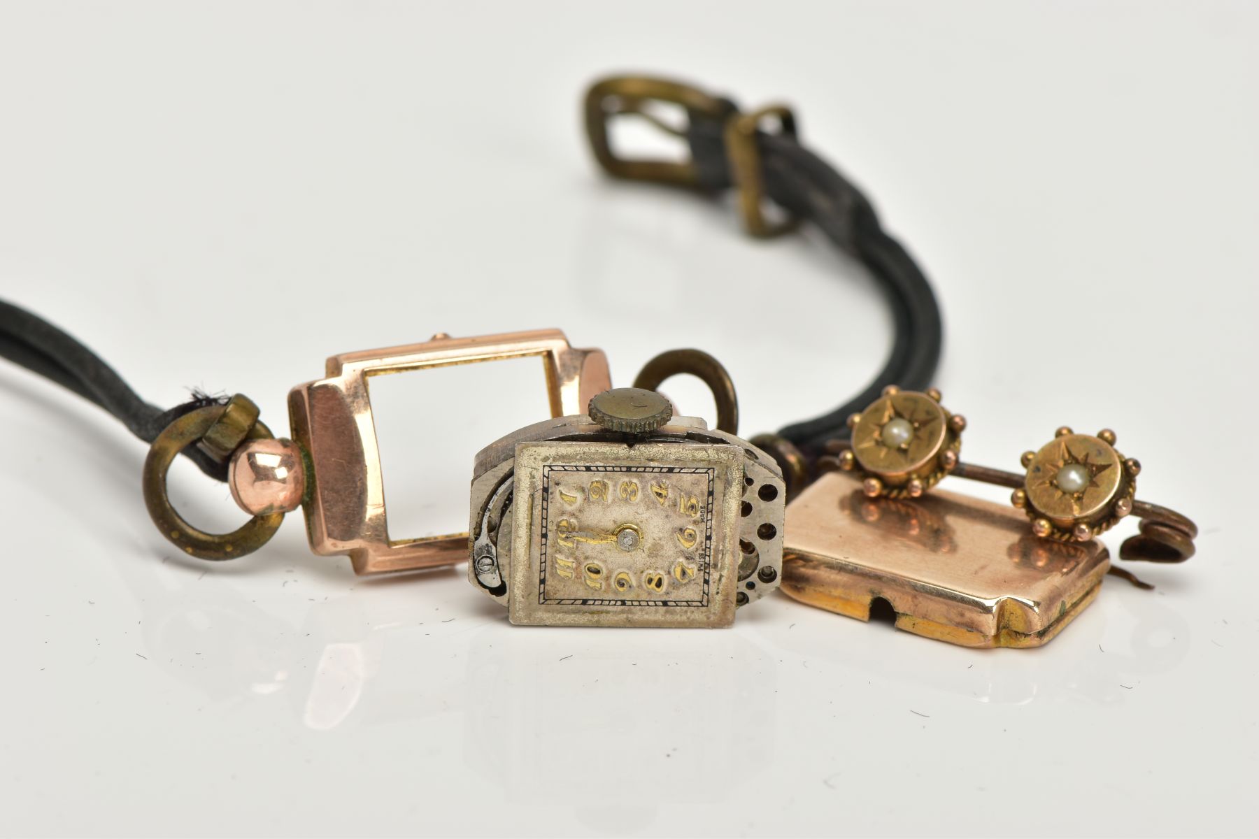 A 9CT GOLD LADIES WRISTWATCH AND LATE 19TH CENTURY BAR BROOCH, a rectangular gold cased ladies