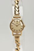 A LADIES 9CT GOLD 'OMEGA' WRISTWATCH, round gold dial signed 'Omega', baton markers, black hands,