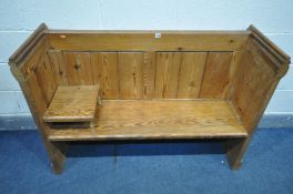 A PITCH PINE PEW, later added shelf, length 131cm x depth 43cm x height 91cm (condition - general