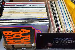 TWO BOXES CONTAINING OVER ONE HUNDRED LPS OF JAZZ MUSIC artists include Benny Goodman, Charlie