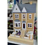 A LARGE MODERN WOODEN DOLLS HOUSE, modelled as a two storey Georgian style house with basement and