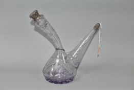 A LATE 19TH/ EARLY 20TH CENTURY SPANISH STYLE PORRON DECANTER WITH WHITE METAL MOUNTS, the stopper