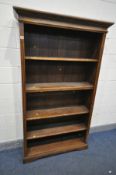 A REPRODUCTION OAK OPEN BOOKCASE, with five adjustable shelves, width 109cm x depth 35cm x height