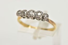 A YELLOW METAL FIVE STONE DIAMOND RING, five old cut diamonds in a white metal illusion setting,