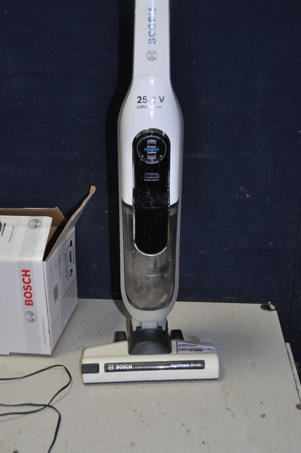 A BOSCH ATHLET 25.2V CORDLES UPRIGHT VACUUM CLEANER with original box, attachments and charger ( - Image 2 of 3
