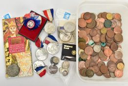 A PLASTIC TUB OF COINS AND COMMEMORATIVES, to include two WWII defence medals, a 1997 royal mint