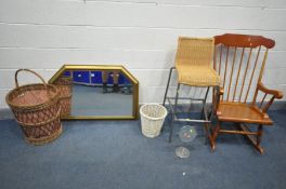 A STAINED BEECH SPINDLE BACK ROCKING CHAIR, a modern gilt overmantel mirror, a wrought iron high