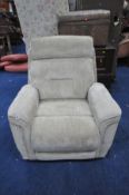 A BEIGE UPHOLSTERED ELECTRIC RECLINING ARMCHAIR (plug broken so untested)