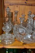 EIGHT DECANTERS AND OTHER PIECES OF CUT GLASS, to include a French sectional decanter (missing